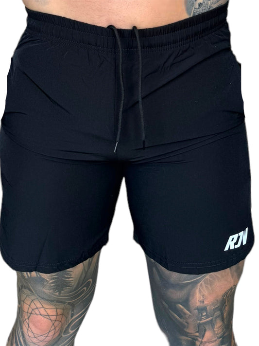 The Elevate Black shorts are an easy-to-wear short that can be styled many ways - making it an essential piece in any guy's short collection. We've created an elastic waist short and thrown a little spandex in there so it has stretch for days! Chillin' in comfort without sacrificing style has never been so effortless.