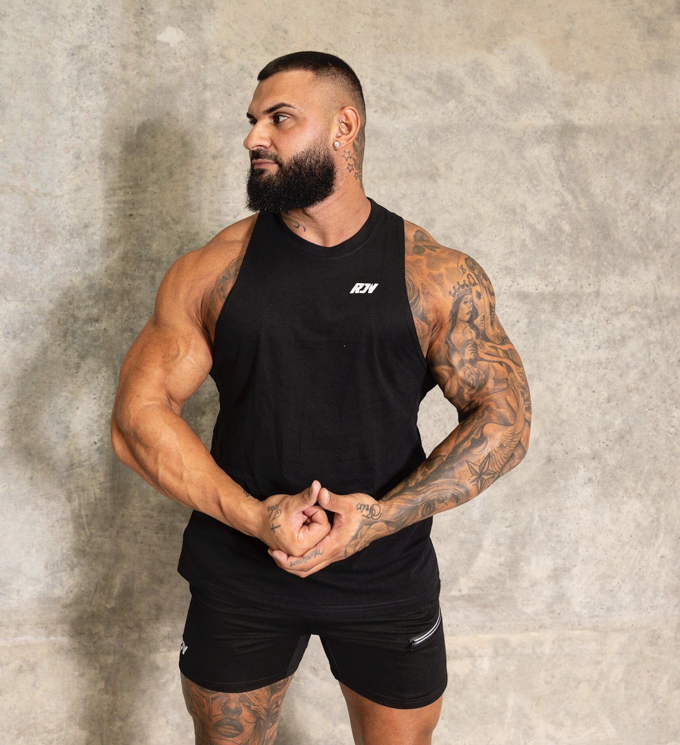 The Mens Tank vest is the perfect pick to add to your workout wardrobe. Featuring a crew neckline, drop armhole & finished with a RON logo on the front and to a finishing touch Ready or not along the back.