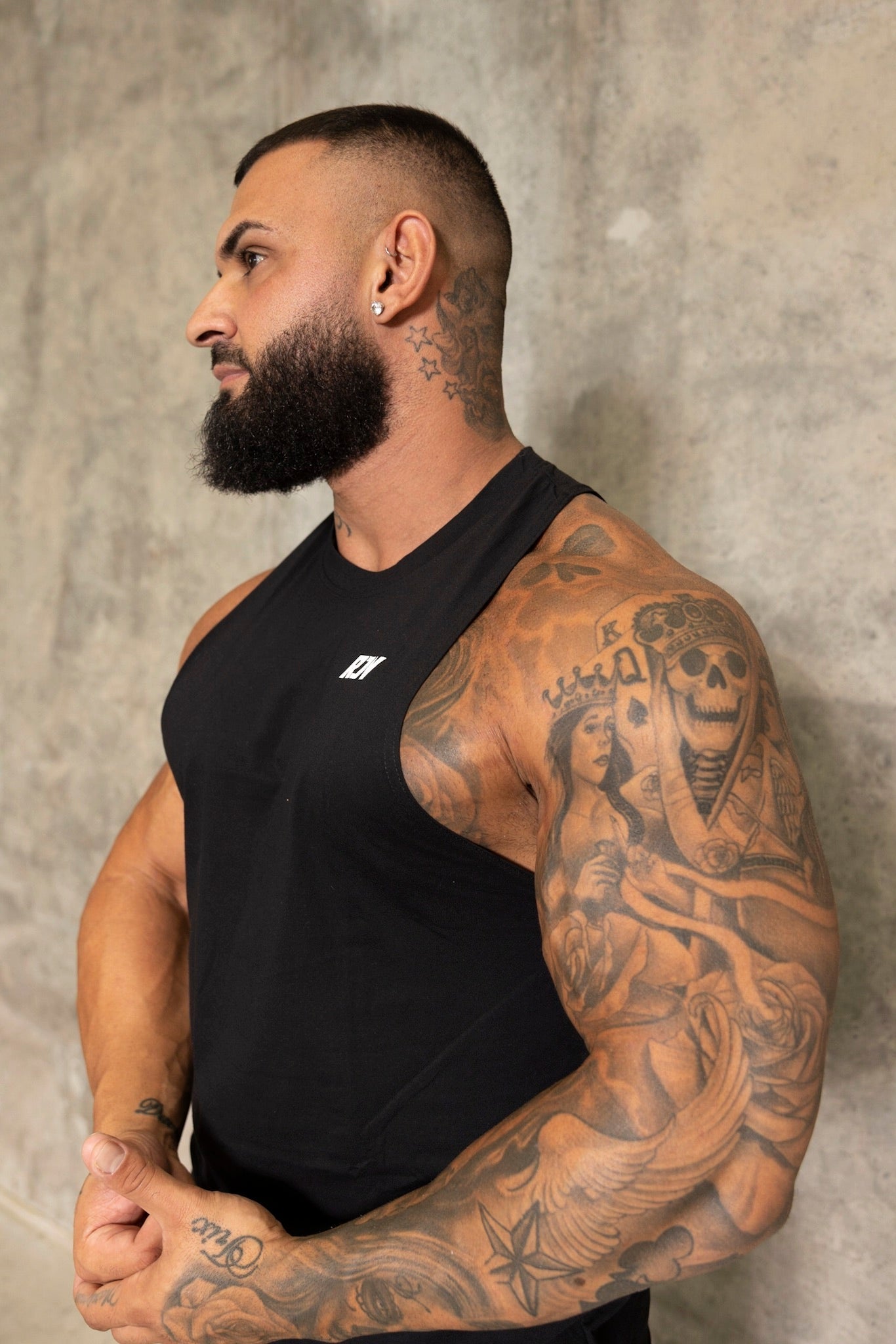 The Mens Tank vest is the perfect pick to add to your workout wardrobe. Featuring a crew neckline, drop armhole & finished with a RON logo on the front and to a finishing touch Ready or not along the back.